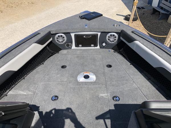 Slide: The Image of 2024 Alumacraft Trophy 195 boat interior with spacious deck and storage compartments. - 10