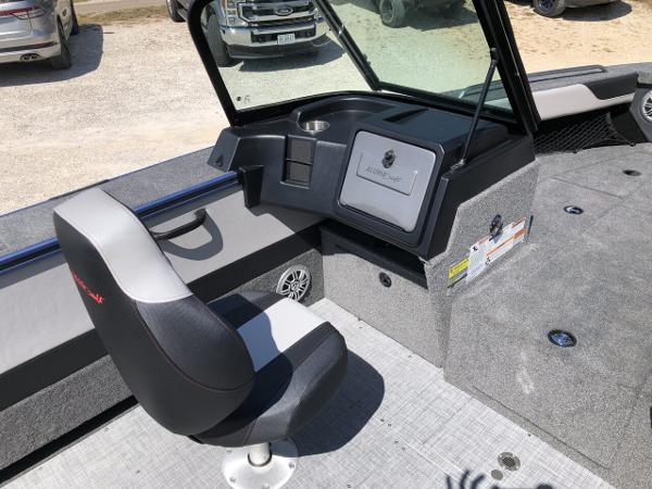 Slide: The Image of 2024 Alumacraft Trophy 195 boat interior with captain's chair and dashboard. - 8