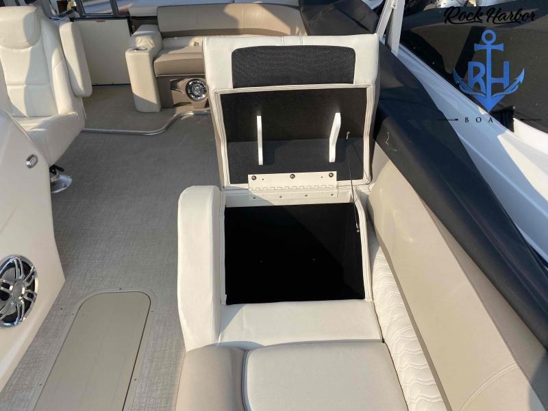 Slide: The Image of 2023 Avalon 2585 Catalina Cruise Funship interior with open storage compartment. - 19