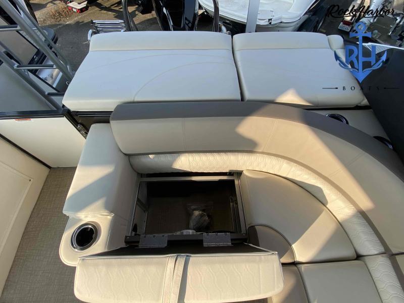 Slide: The Image of 2023 Avalon 2585 Catalina Cruise Funship interior seating with storage compartment. - 20