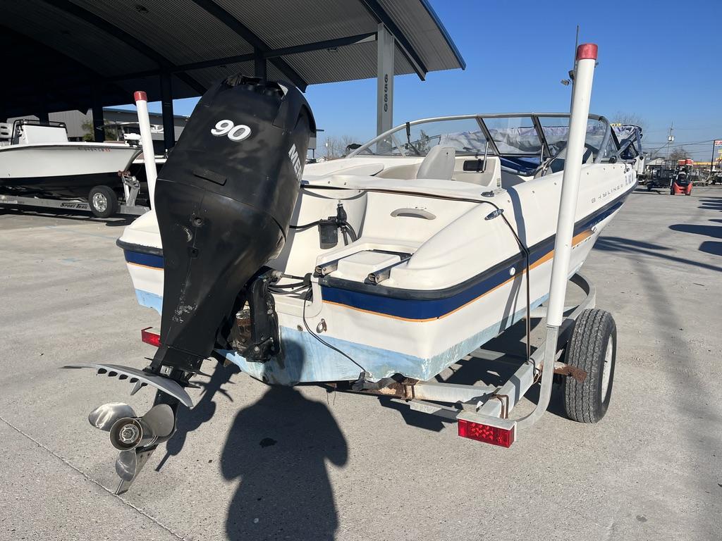 Slide: The Image of 2004 Bayliner 175 boat on trailer with 90 HP outboard motor. - 4