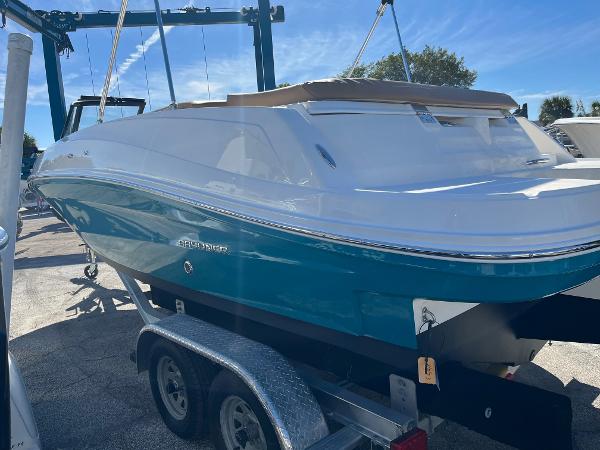 Slide: The Image of 2020 Bayliner VR5 boat on a trailer under a clear blue sky. - 3