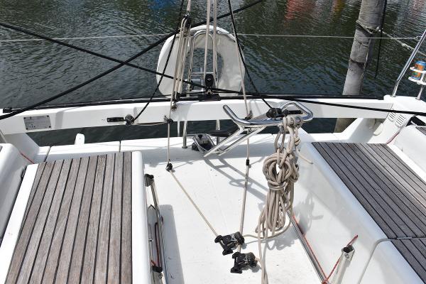 Slide: The Image of Cockpit of 2012 Beneteau First 30 sailboat with teak seats and rigging. - 13