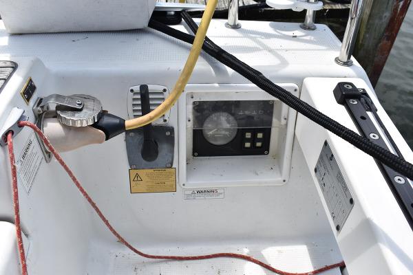 Slide: The Image of Beneteau First 30 2012 cockpit control panel with throttle and navigation instruments. - 15
