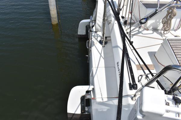 Slide: The Image of 2012 Beneteau First 30 sailboat docked at marina. - 16