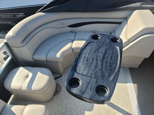 Slide: The Image of 2016 Bennington 20 SS boat interior with seating and table. - 11