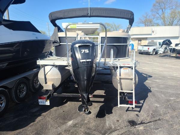 Slide: The Image of 2016 Bennington 20 SS pontoon boat with 75 HP outboard motor, rear view. - 2