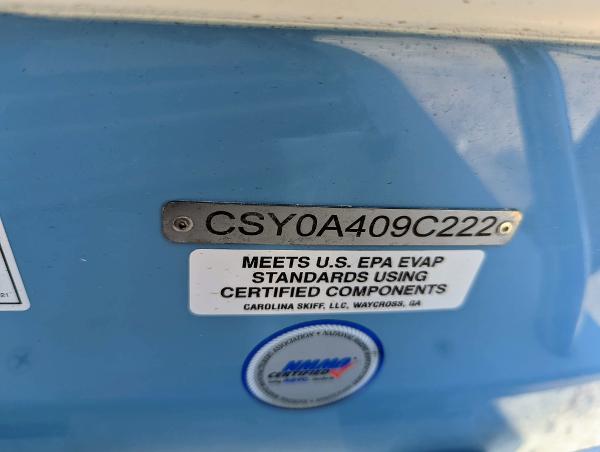 Slide: The Image of 2022 Carolina Skiff 24 Ultra Elite boat identification plate and EPA compliance label. - 10