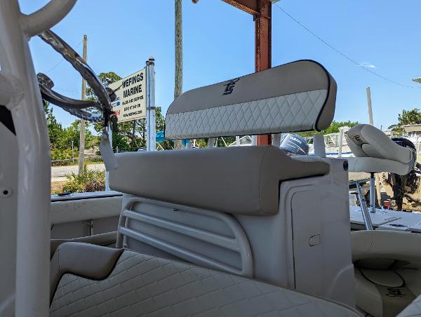 Slide: The Image of 2022 Carolina Skiff 24 Ultra Elite boat interior with cushioned seating. - 5