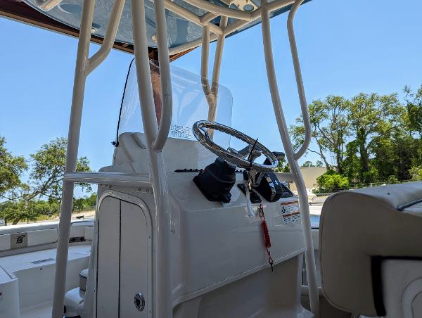 Slide: The Image of 2022 Carolina Skiff 24 Ultra Elite boat console and steering wheel. - 6