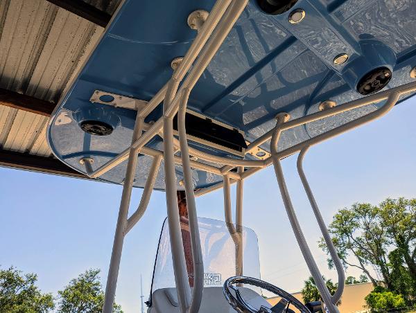 Slide: The Image of 2022 Carolina Skiff 24 Ultra Elite boat canopy and console. - 7