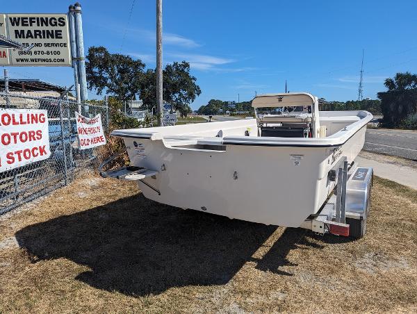 Slide: The Image of 2024 Carolina Skiff E Series 24ft CC boat on trailer at Wefings Marine. - 2