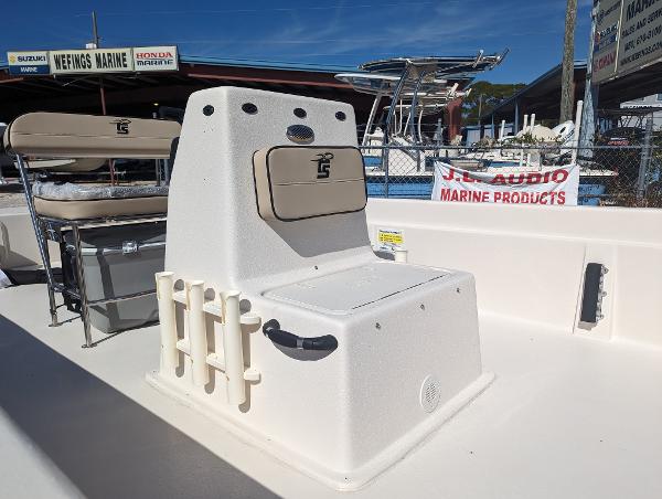 Slide: The Image of 2024 Carolina Skiff E Series 24ft CC center console boat at marine dealership. - 4