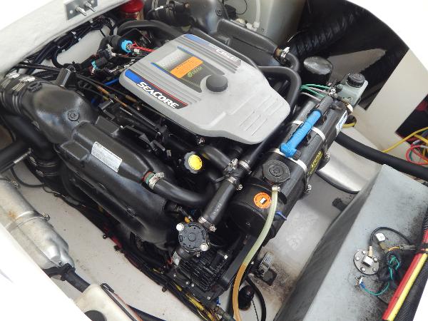 Slide: The Image of 2013 Chaparral 225 SSi boat engine compartment with Seacore engine. - 17