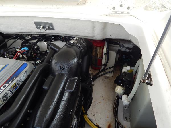 Slide: The Image of Engine compartment of a 2013 Chaparral 225 SSi boat. - 21