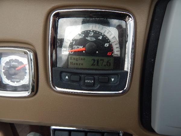 Slide: The Image of 2013 Chaparral 225 SSi engine hours gauge showing 217.6 hours. - 37