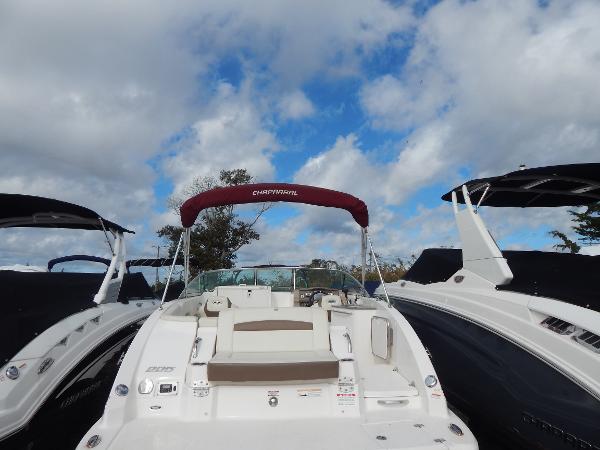 Slide: The Image of 2013 Chaparral 225 SSi boat with red canopy, rear view. - 9