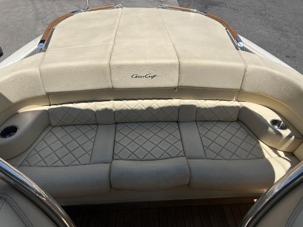 Slide: The Image of 2020 Chris-Craft Capri 21 boat with beige leather seating and diamond stitching. - 18