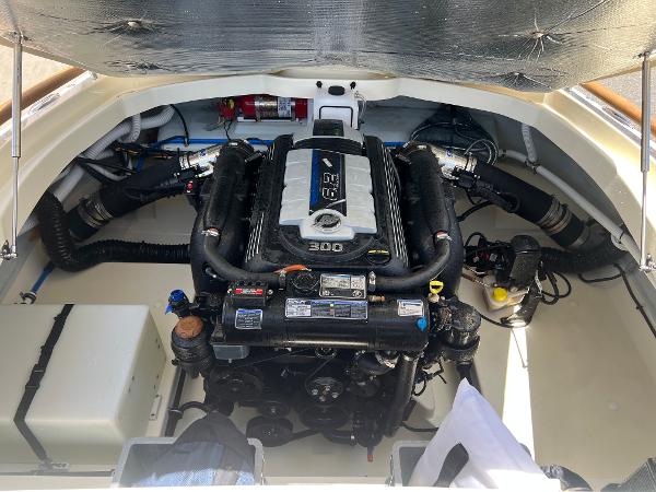 Slide: The Image of 2020 Chris-Craft Capri 21 engine compartment with 300 HP engine. - 19