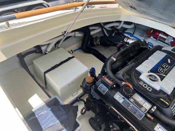 Slide: The Image of 2020 Chris-Craft Capri 21 engine compartment with 6.2L 300 HP engine. - 21