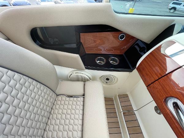 Slide: The Image of 2024 Chris-Craft Launch 31 GT interior with elegant seating and wood accents. - 34