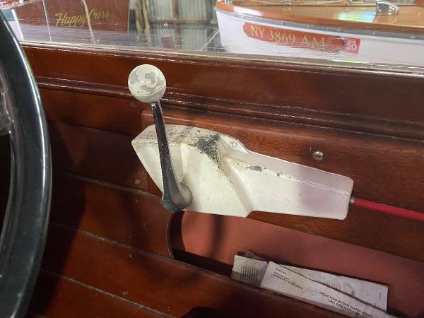 Slide: The Image of 1959 Chris-Craft Sportsman boat interior with vintage throttle control. - 12