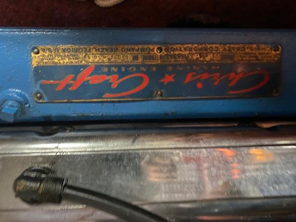 Slide: The Image of 1959 Chris-Craft Sportsman engine label in blue and red. - 16