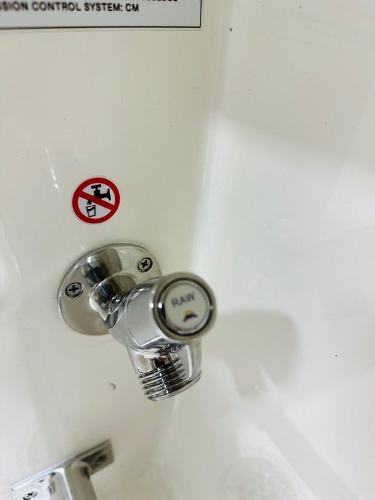Slide: The Image of 2024 Cobia 262 CC boat control knob with warning symbol. - 5