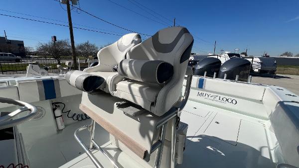 Slide: The Image of 2005 Contender 36 Open boat with dual seats and Muy Loco name on the side. - 11