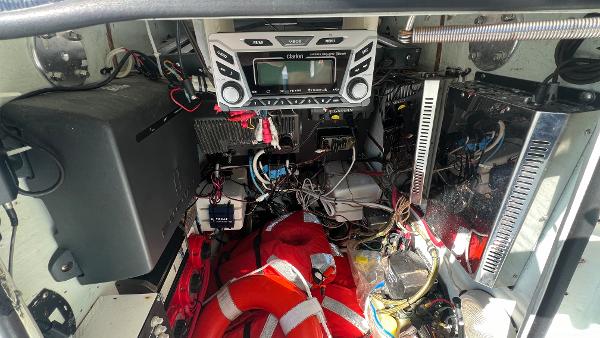Slide: The Image of 2005 Contender 36 Open boat electronics and wiring compartment. - 20