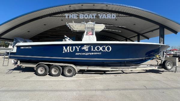 Slide: The Image of 2005 Contender 36 Open boat on a trailer at The Boat Yard. - 28