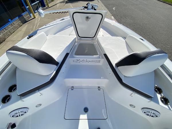 Slide: The Image of 2024 Crevalle 26 HCO boat interior with seating and storage compartments. - 9