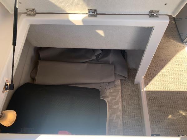 Slide: The Image of Storage compartment in 2022 Cutwater C-24 Coupe boat. - 17