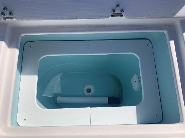 Slide: The Image of Livewell compartment of a 2022 Cutwater C-24 Coupe boat. - 5