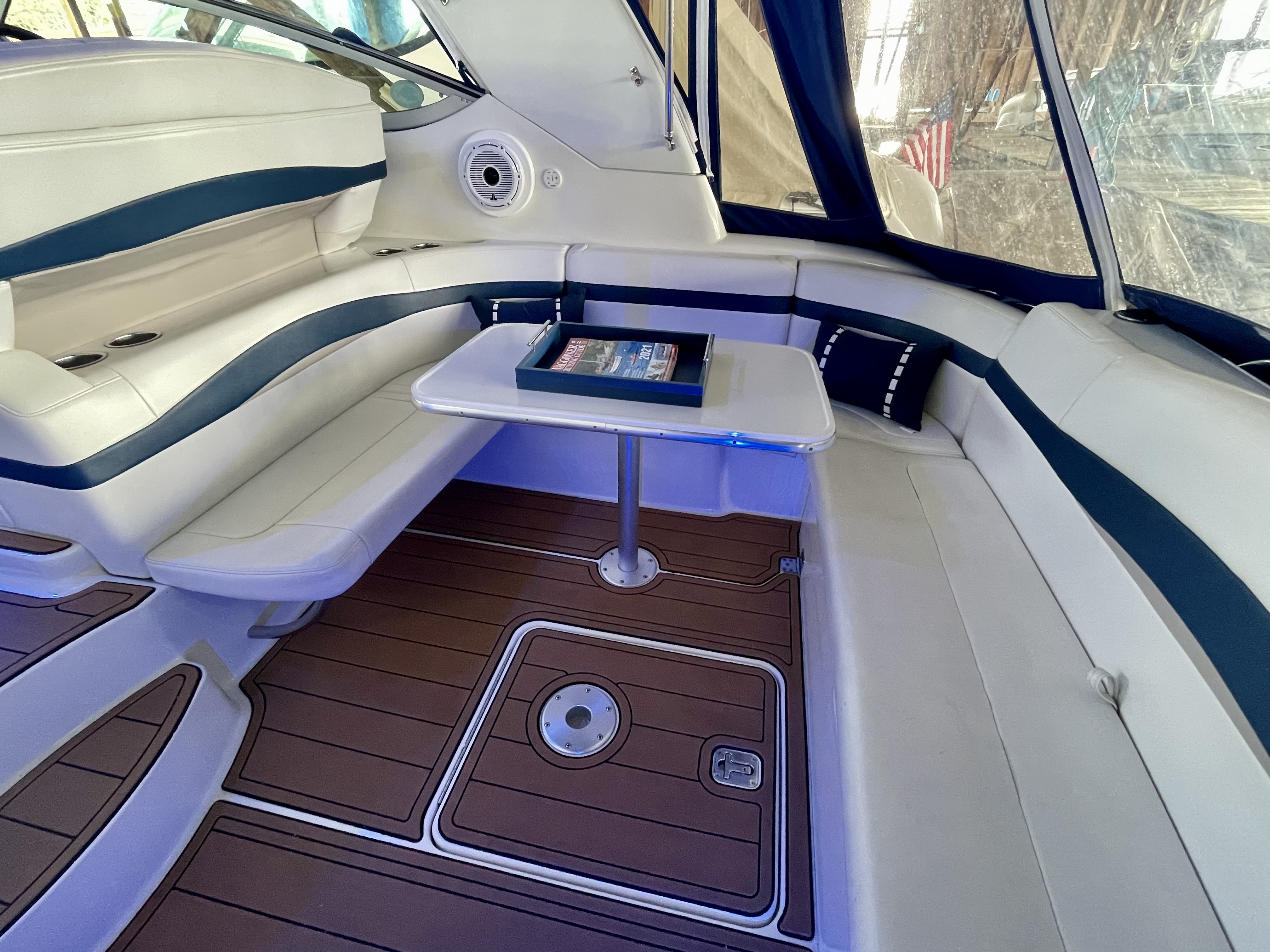 Slide: The Image of Interior of a 2000 Formula 37 PC yacht with white and blue seating. - 14