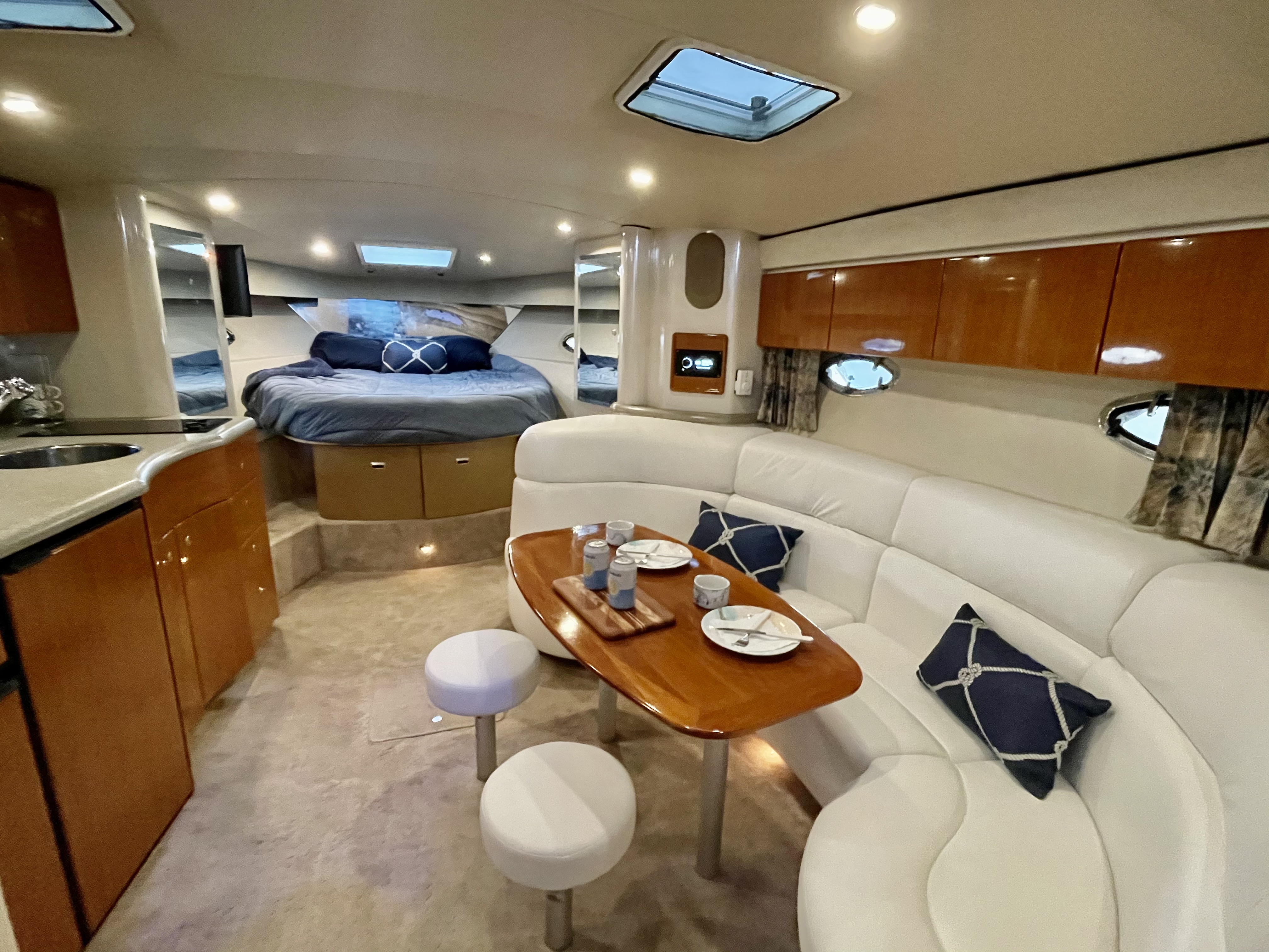 Slide: The Image of Interior of 2000 Formula 37 PC yacht with dining area and bed. - 18