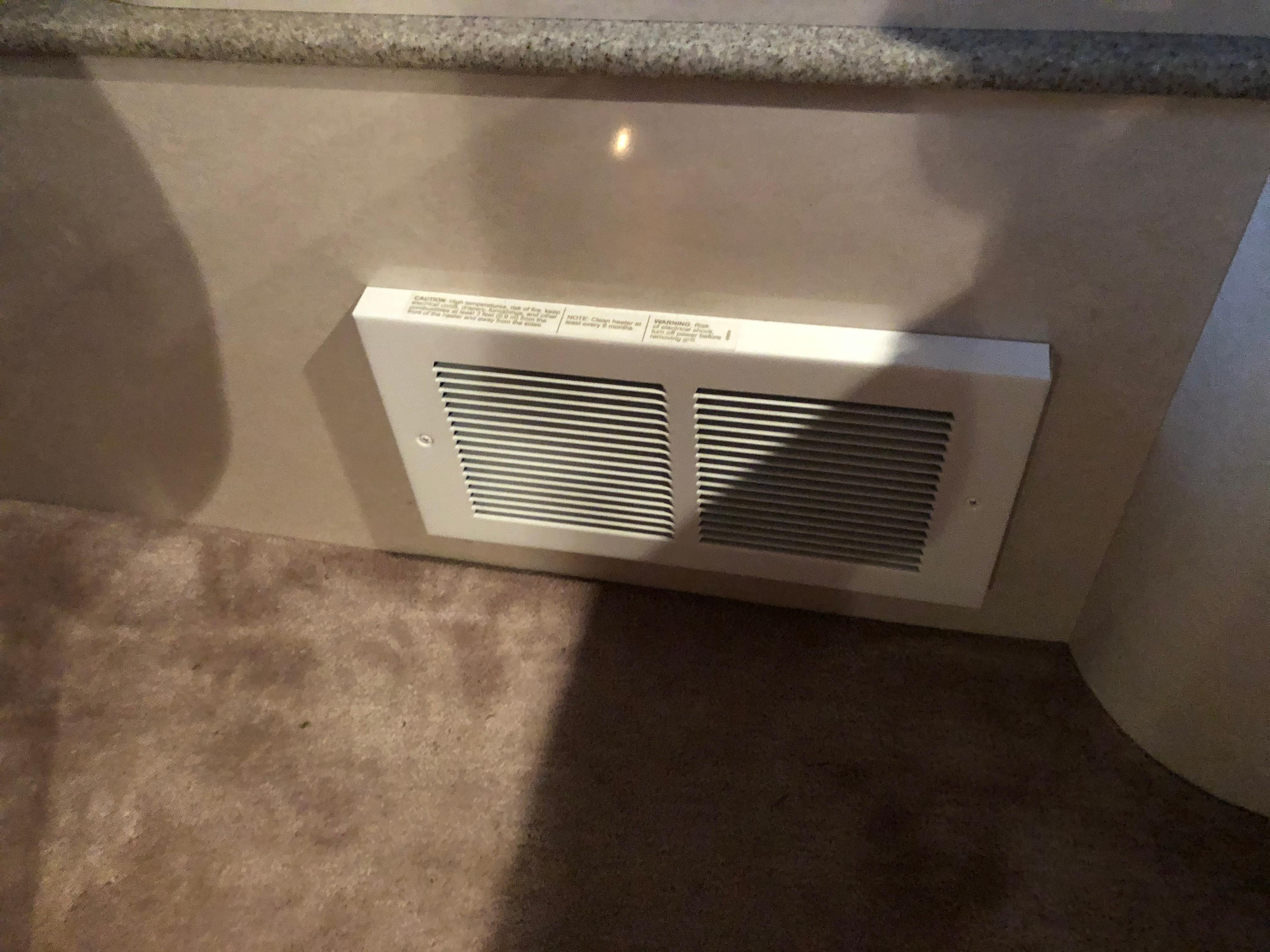 Slide: The Image of Ventilation grille inside a 2000 Formula 37 PC boat, located near the floor. - 39