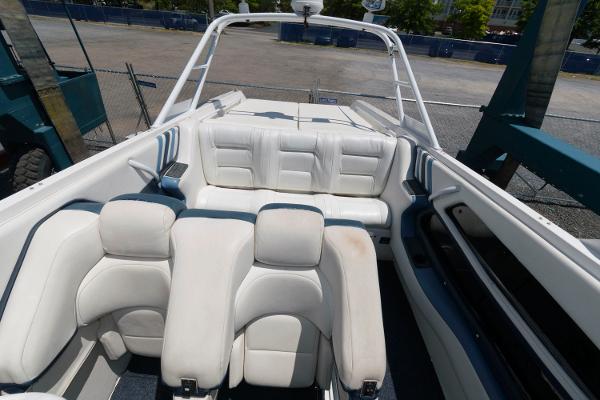 Slide: The Image of 1991 Fountain 38 Sport Cruiser interior with white leather seating. - 8
