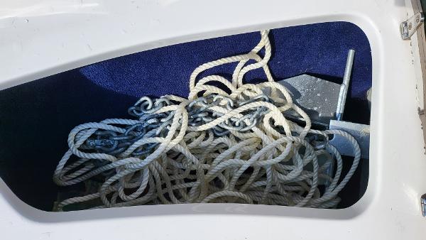 Slide: The Image of Anchor and ropes in storage compartment of 1996 Four Winns 190 Horizon Bowrider. - 21