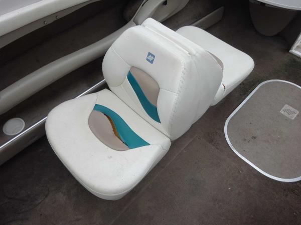 Slide: The Image of 1998 Four Winns 200 Horizon boat seats with white and teal upholstery. - 15