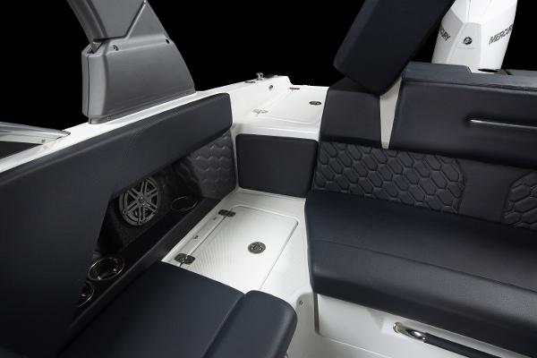 Slide: The Image of 2023 Four Winns H2 OB boat interior with black and white seating. - 23
