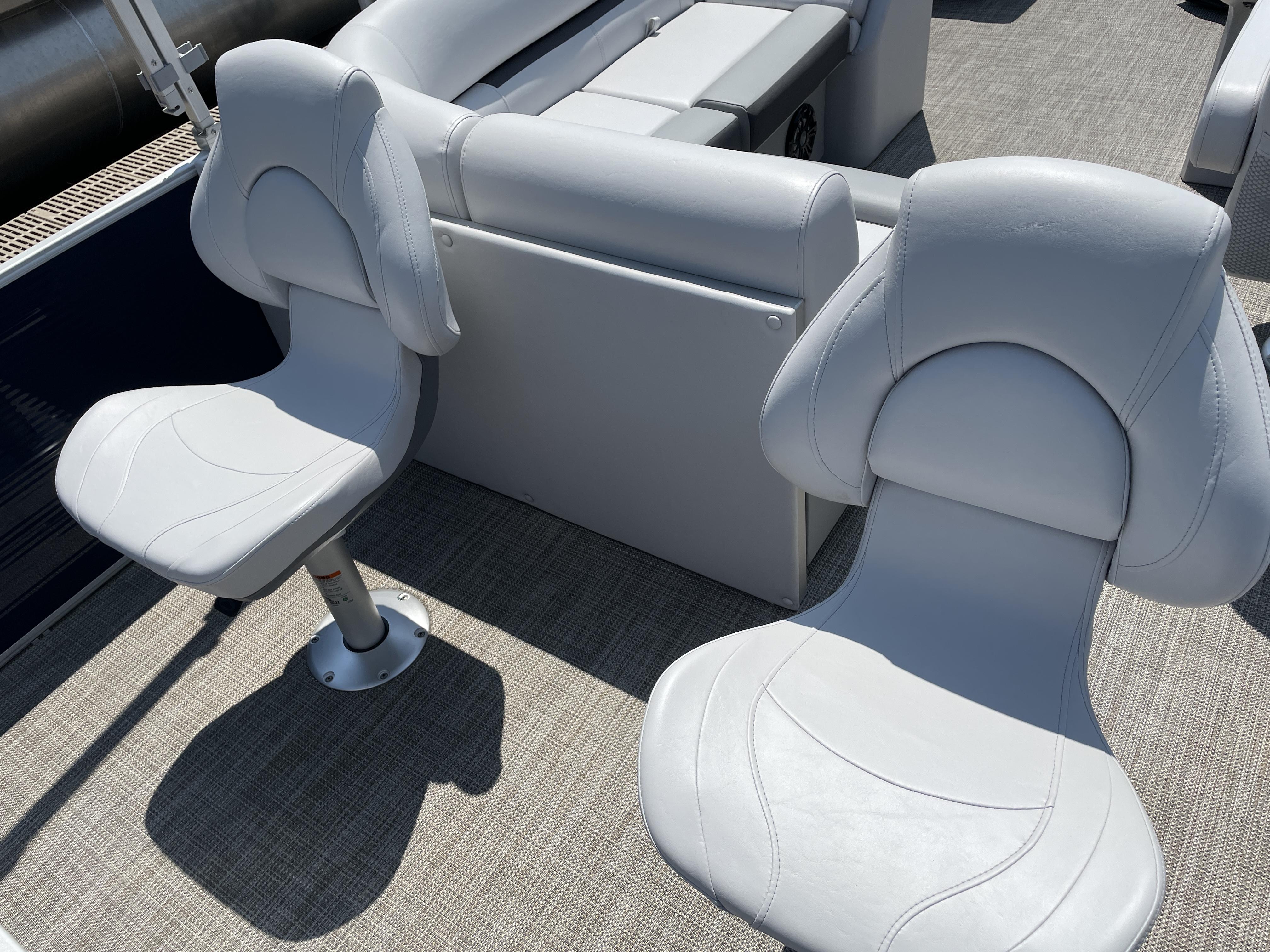 Slide: The Image of 2024 Godfrey SW2186FS boat with two white cushioned seats. - 4
