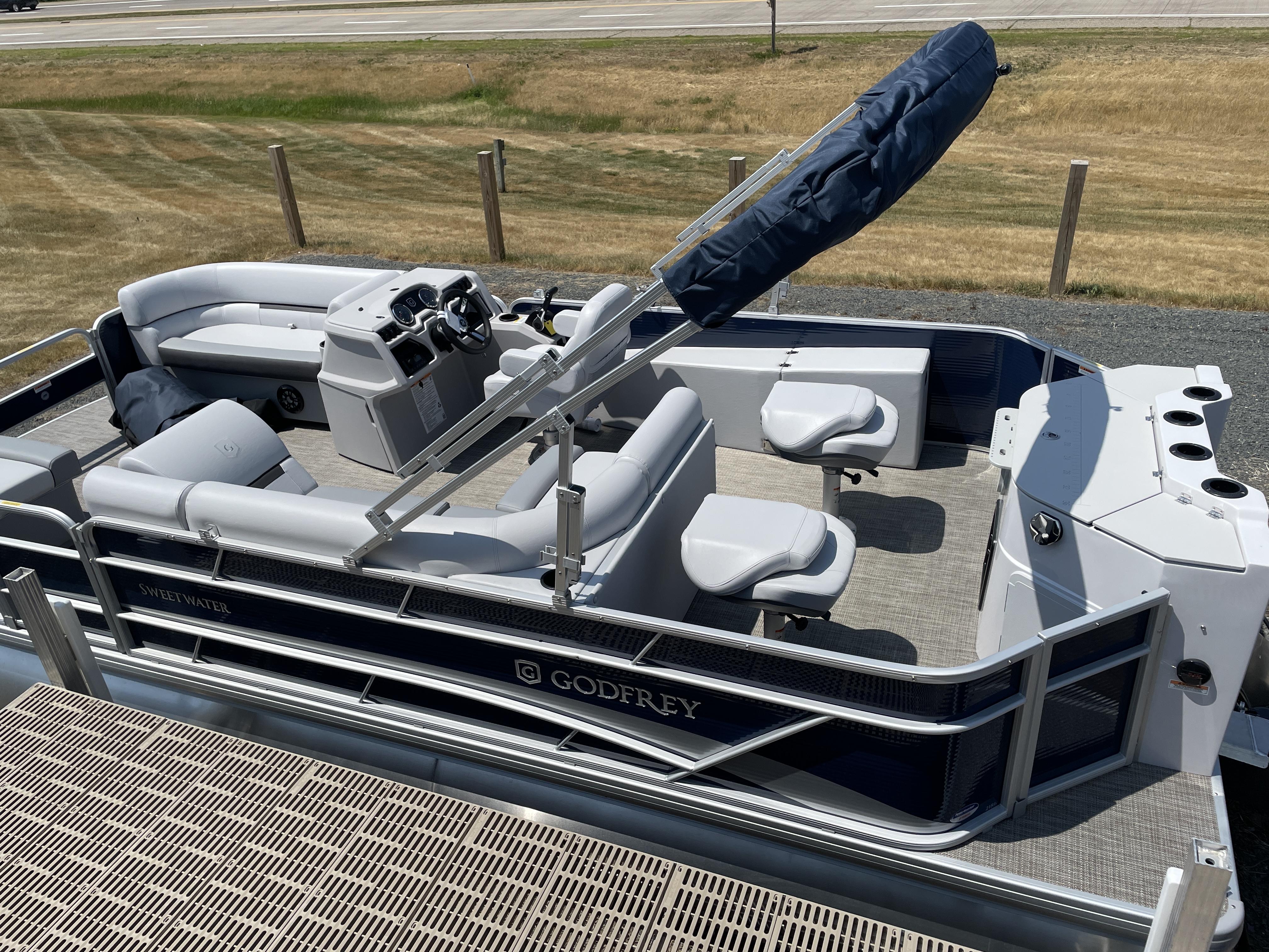 Slide: The Image of 2024 Godfrey SW2186FS pontoon boat with seating and steering console. - 6