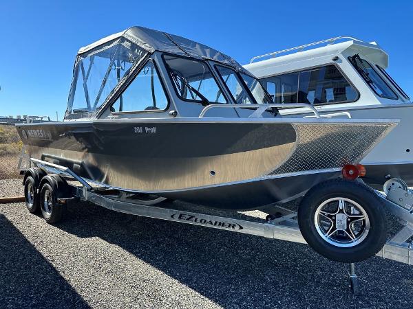 Slide: The Image of 2024 Hewescraft 200 Pro-V boat on EZ Loader trailer. - 0