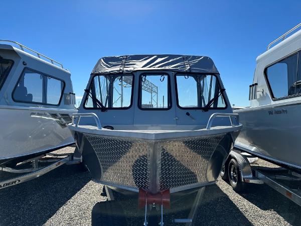Slide: The Image of 2024 Hewescraft 200 Pro-V boat front view in a lot. - 1