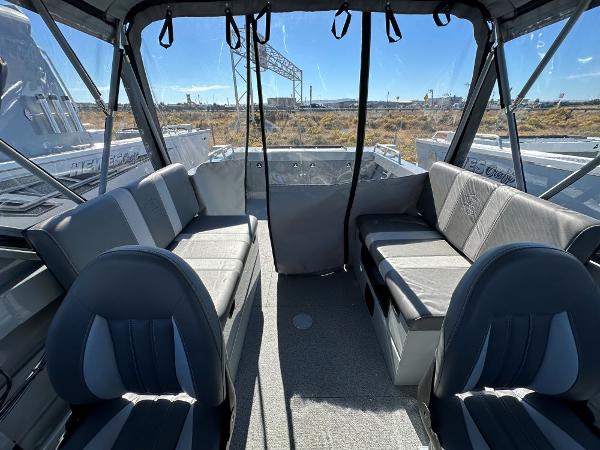 Slide: The Image of Interior of 2024 Hewescraft 200 Pro-V boat with seating and canopy. - 7