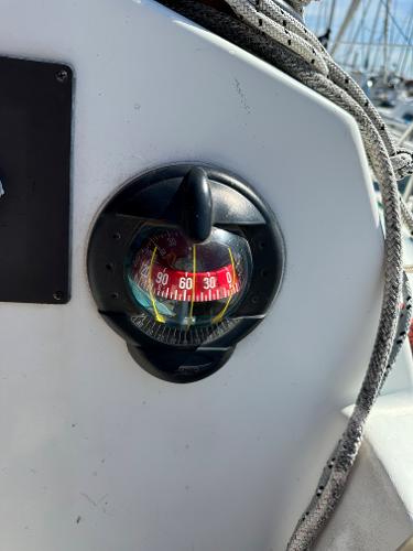 Slide: The Image of Compass on 1986 J Boats J30 sailboat cockpit. - 14