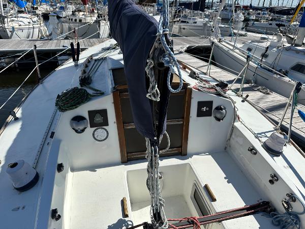 Slide: The Image of 1986 J Boats J30 sailboat cockpit in marina. - 2