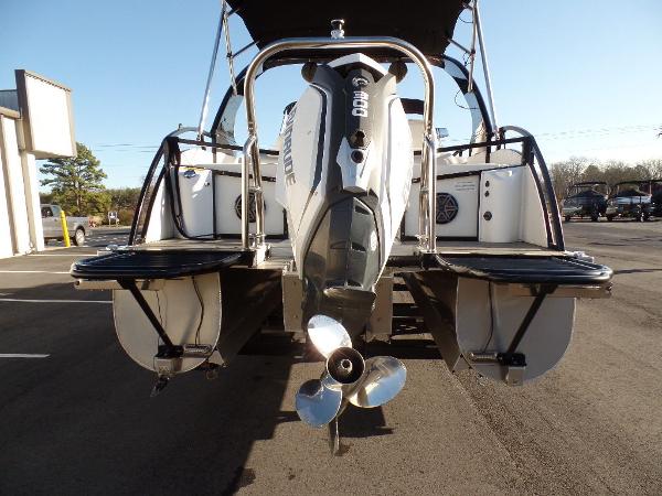 Slide: The Image of 2017 JC Sporttoon 28TT pontoon boat rear view with outboard motor. - 2