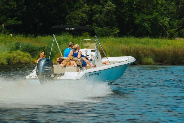 Slide: The Image of 2024 Key West 189 FS boat cruising on a lake with passengers. - 26